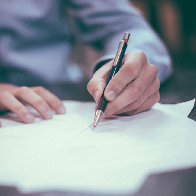 Lawyer Writing With Pen