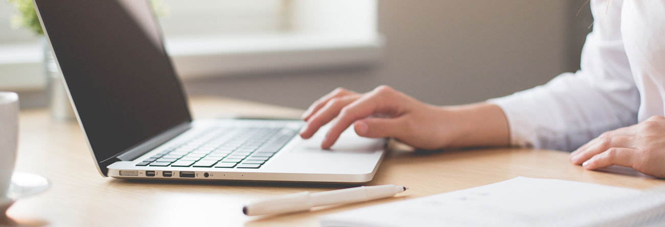 Lawyer Typing on Laptop